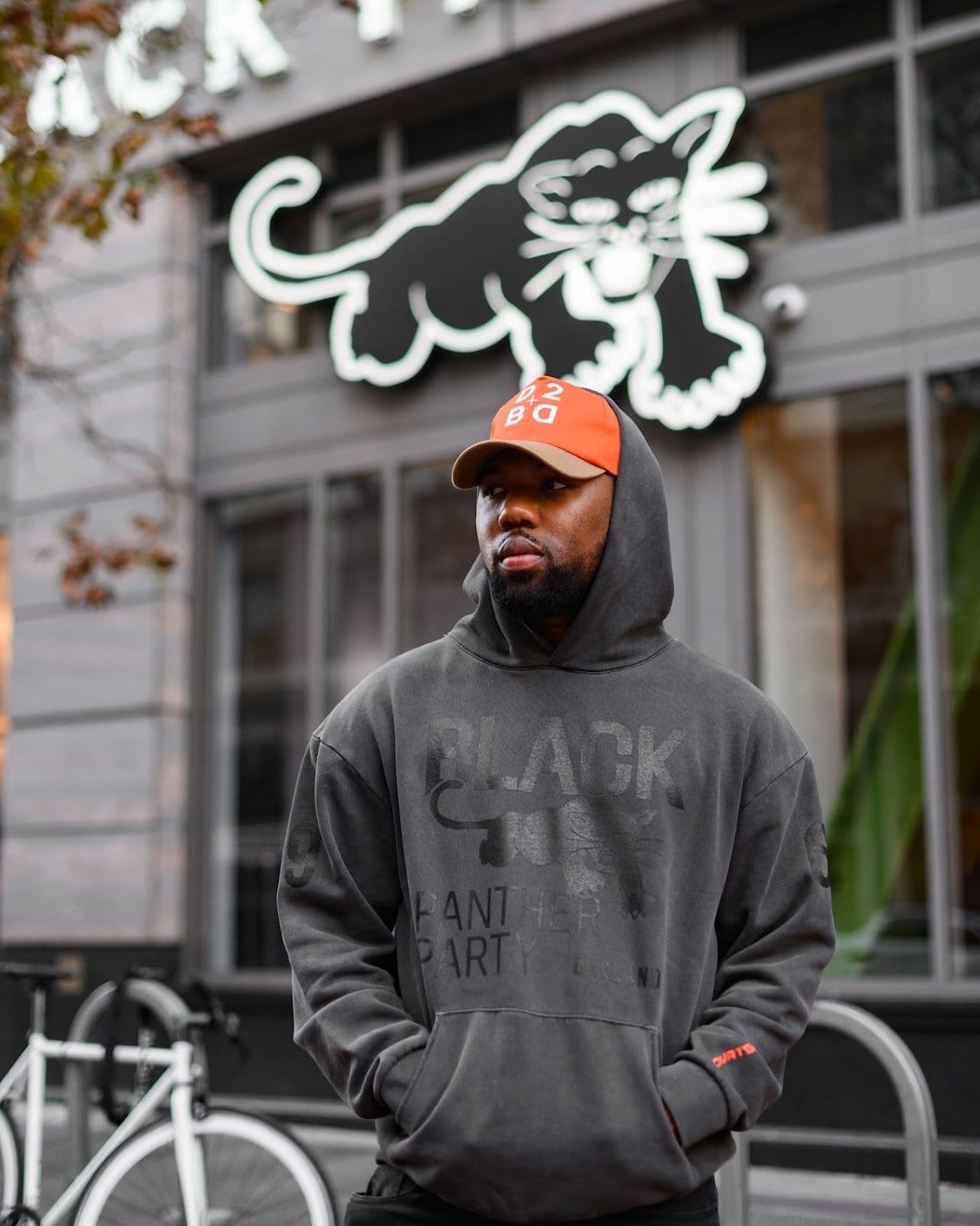 Oke outside a Black Panther Party landmark in Oakland