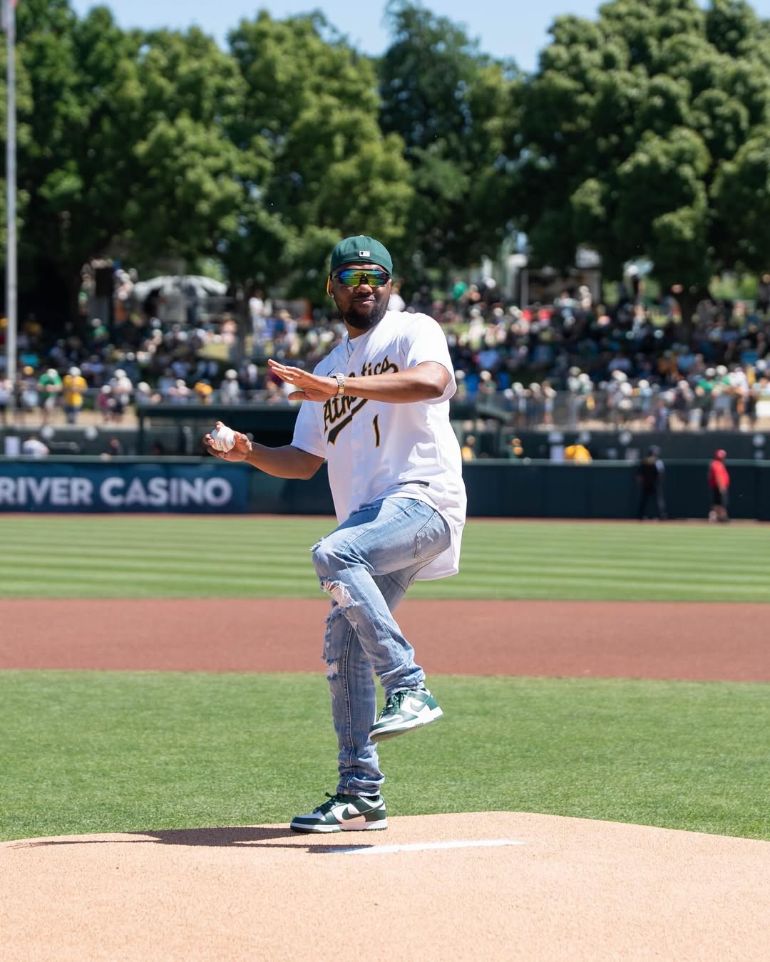 Oke McFly throwing the ceremonial first pitch for the Athletics